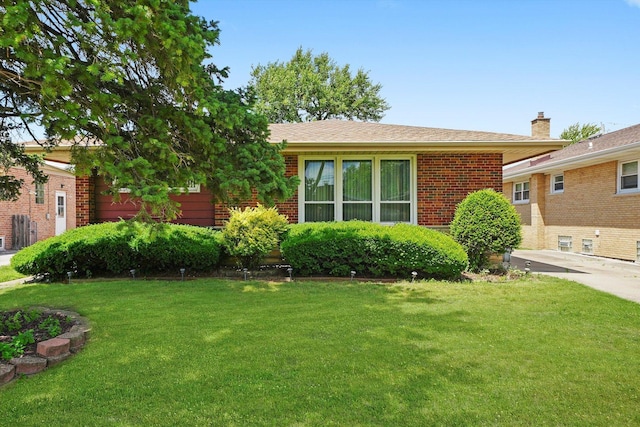 5504 Oakdale Dr, Oak Lawn, IL 60453 - view of front of house with brick siding and a front yard