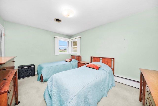 5504 Oakdale Dr, Oak Lawn, IL 60453 - bedroom with baseboard heating and light carpet