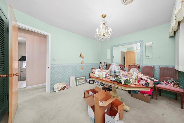 5504 Oakdale Dr, Oak Lawn, IL 60453 - carpeted dining area featuring a chandelier, a wainscoted wall, and wallpapered walls
