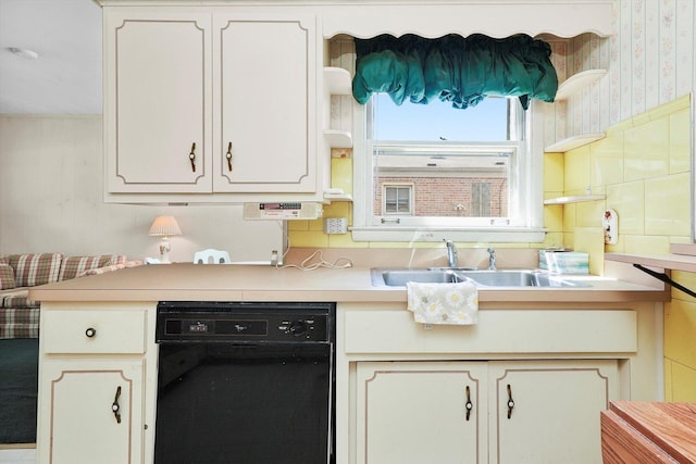 5504 Oakdale Dr, Oak Lawn, IL 60453 - kitchen with black dishwasher, open shelves, light countertops, and wallpapered walls