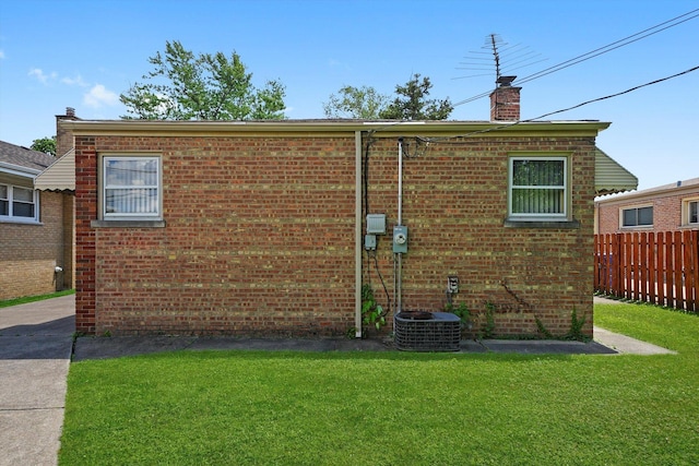 5504 Oakdale Dr, Oak Lawn, IL 60453 - view of property exterior with brick siding and a chimney