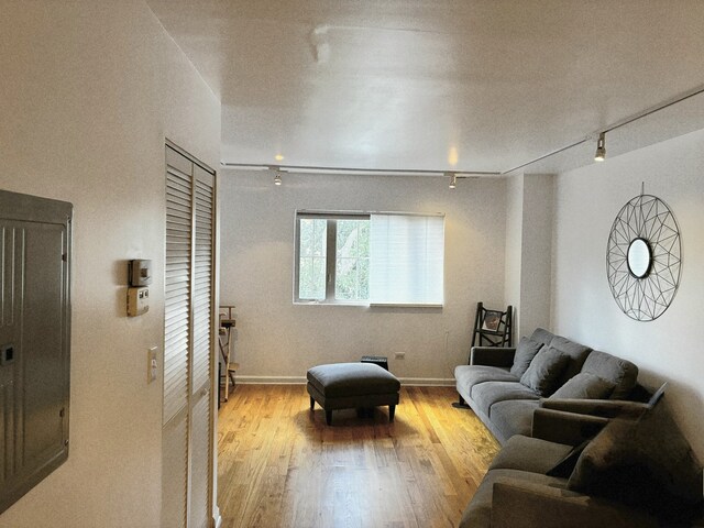6400 N Sacramento Ave Unit 205, Chicago, IL 60645 - living area featuring track lighting and wood finished floors
