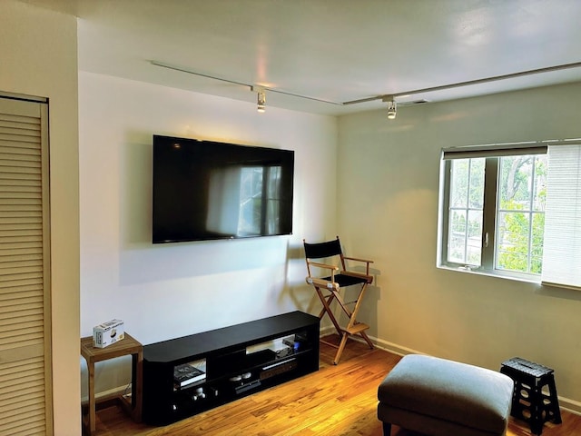 6400 N Sacramento Ave Unit 205, Chicago, IL 60645 - sitting room featuring track lighting and wood finished floors