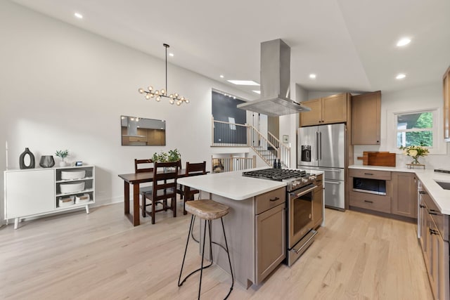 787 Bluejay Cir, Elk Grove Village, IL 60007 - kitchen with appliances with stainless steel finishes, island range hood, lofted ceiling, light wood-type flooring, and light countertops