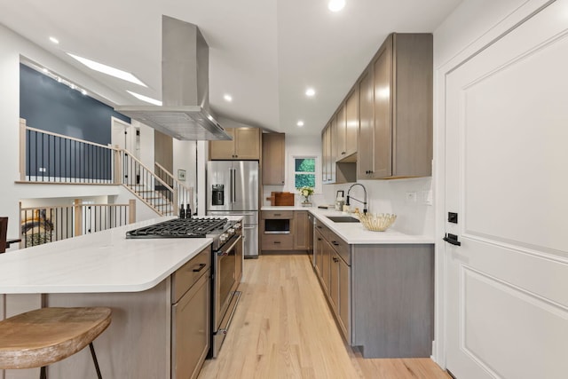 787 Bluejay Cir, Elk Grove Village, IL 60007 - kitchen with appliances with stainless steel finishes, light wood-type flooring, a large island, light countertops, and recessed lighting