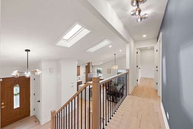 787 Bluejay Cir, Elk Grove Village, IL 60007 - hallway featuring an upstairs landing, a chandelier, light wood finished floors, healthy amount of natural light, and recessed lighting