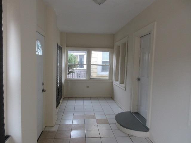 7522 S Merrill Ave, Chicago, IL 60649 - hall with light tile patterned floors