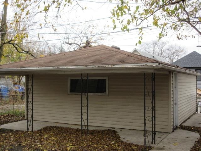 7522 S Merrill Ave, Chicago, IL 60649 - view of home's exterior featuring a shingled roof