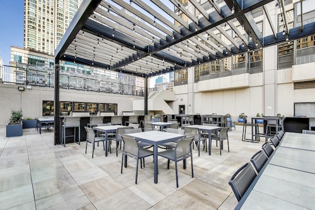 30 E Huron St Unit 2602, Chicago, IL 60611 - view of patio / terrace with outdoor dining area and a pergola