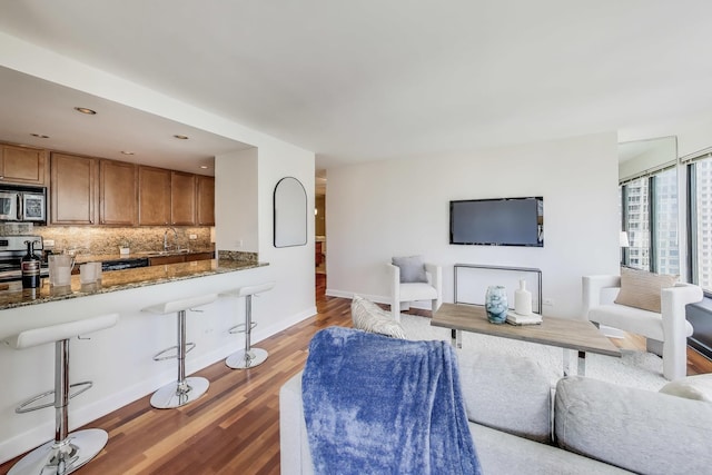 30 E Huron St Unit 2602, Chicago, IL 60611 - living room with light wood-style flooring and recessed lighting