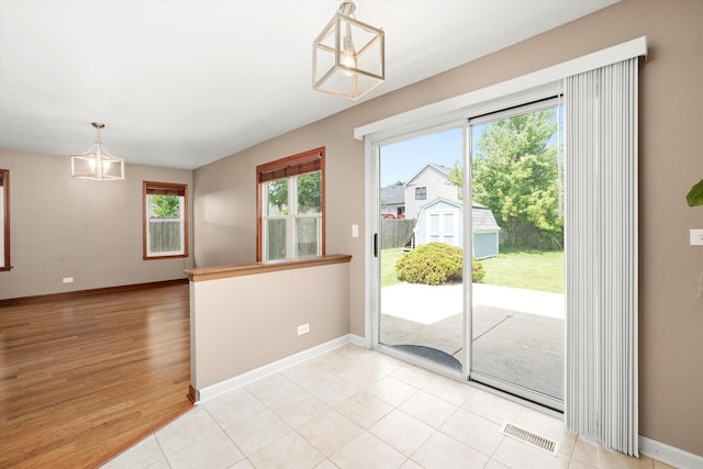 1097 Dovercliff Way, Crystal Lake, IL 60014 - entryway featuring a chandelier and light wood-style floors