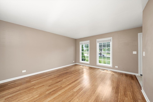 1097 Dovercliff Way, Crystal Lake, IL 60014 - unfurnished room with light wood-style flooring and baseboards