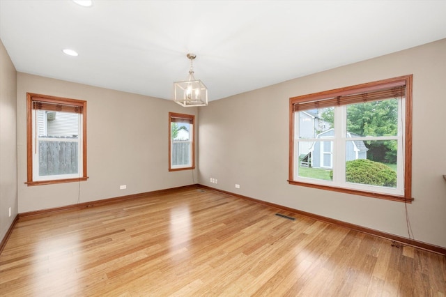 1097 Dovercliff Way, Crystal Lake, IL 60014 - unfurnished room featuring a chandelier, light wood-type flooring, and recessed lighting