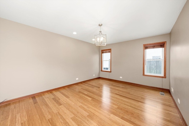 1097 Dovercliff Way, Crystal Lake, IL 60014 - unfurnished room featuring a chandelier, light wood finished floors, and recessed lighting