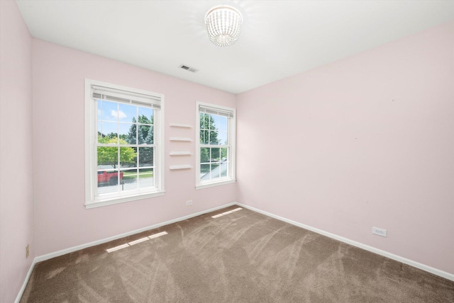 1097 Dovercliff Way, Crystal Lake, IL 60014 - carpeted spare room with baseboards and a chandelier