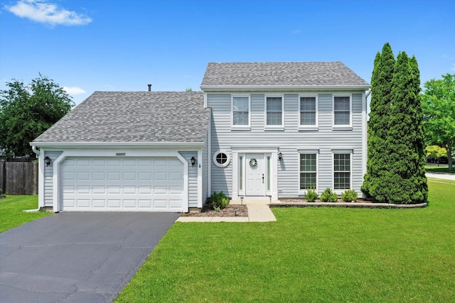 1097 Dovercliff Way, Crystal Lake, IL 60014 - colonial house featuring asphalt driveway, an attached garage, and a shingled roof