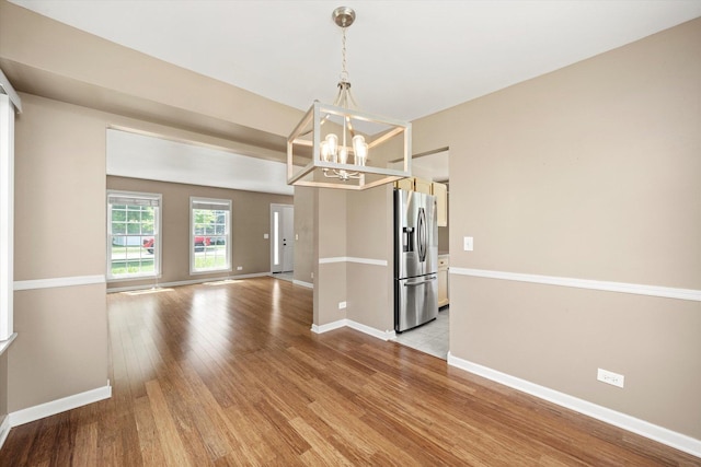 1097 Dovercliff Way, Crystal Lake, IL 60014 - unfurnished room featuring a chandelier and light wood finished floors