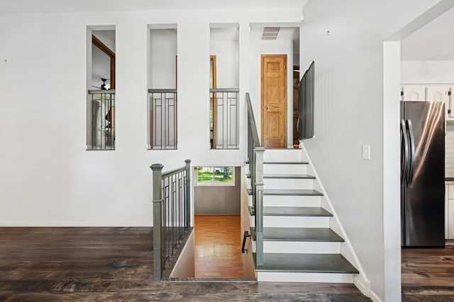 516 W Weathersfield Way, Schaumburg, IL 60193 - stairway with wood finished floors and baseboards