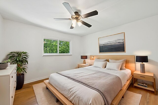 516 W Weathersfield Way, Schaumburg, IL 60193 - bedroom with light wood-type flooring and a ceiling fan
