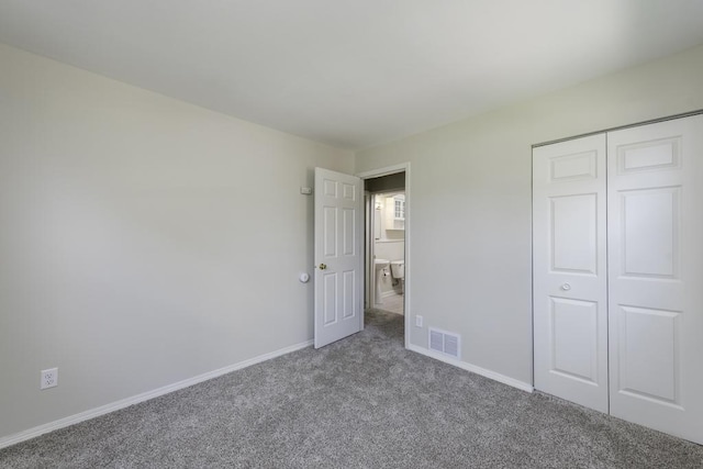 542 Whitney Ave, Winthrop Harbor, IL 60096 - unfurnished bedroom with carpet flooring and a closet