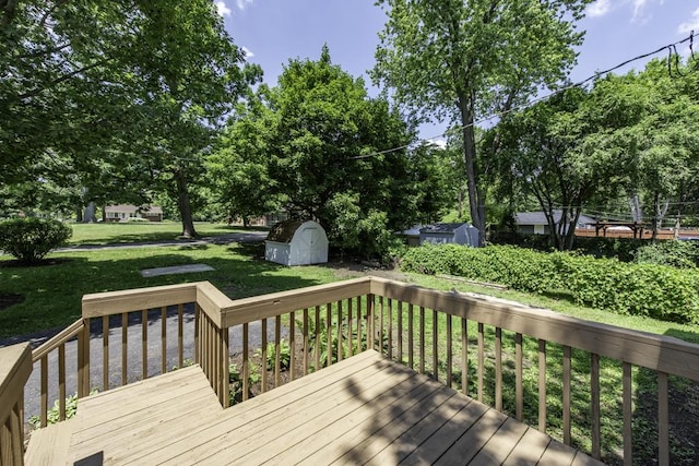 542 Whitney Ave, Winthrop Harbor, IL 60096 - wooden deck featuring a shed, a lawn, and view of scattered trees