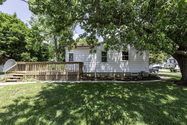 542 Whitney Ave, Winthrop Harbor, IL 60096 - back of house featuring a wooden deck, a yard, crawl space, and a storage shed