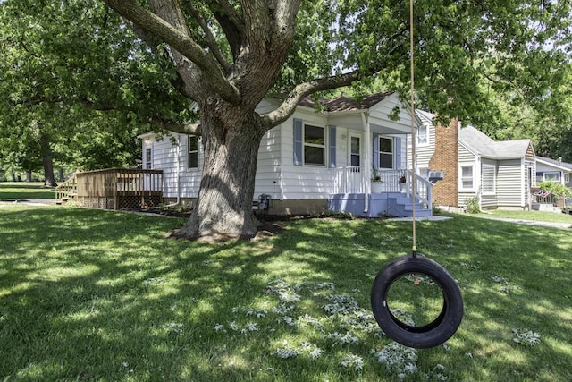 542 Whitney Ave, Winthrop Harbor, IL 60096 - view of front of home with a front yard and a deck