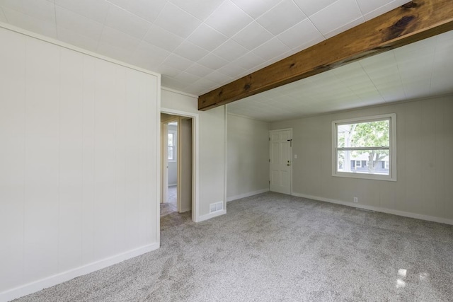 542 Whitney Ave, Winthrop Harbor, IL 60096 - carpeted empty room featuring beam ceiling and baseboards