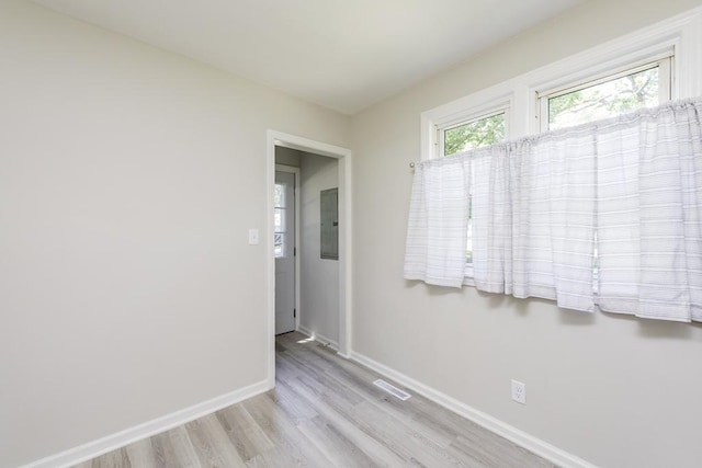 542 Whitney Ave, Winthrop Harbor, IL 60096 - unfurnished room featuring wood finished floors and baseboards