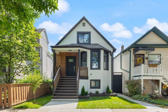4143 N Drake Ave, Chicago, IL 60618 - view of front facade featuring stairway and covered porch