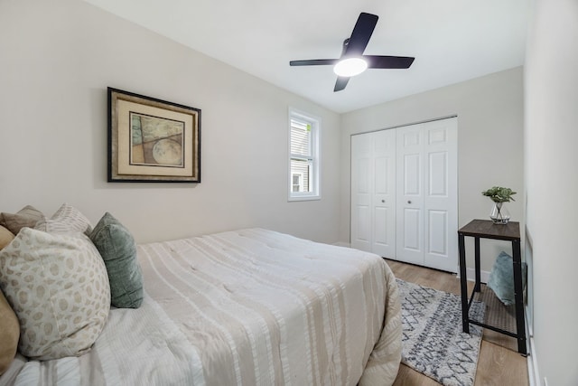 4143 N Drake Ave, Chicago, IL 60618 - bedroom with light wood-style floors, a closet, and ceiling fan