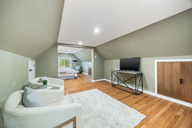 4143 N Drake Ave, Chicago, IL 60618 - living room featuring light wood-style floors, lofted ceiling, and recessed lighting
