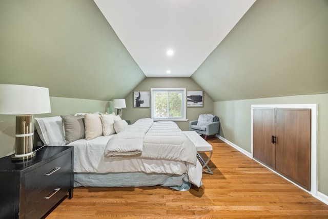 4143 N Drake Ave, Chicago, IL 60618 - bedroom featuring light wood-type flooring and lofted ceiling