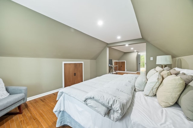 4143 N Drake Ave, Chicago, IL 60618 - bedroom with light wood-type flooring and lofted ceiling