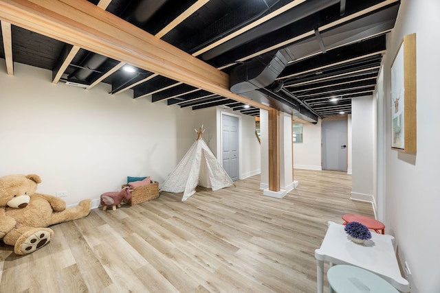 4143 N Drake Ave, Chicago, IL 60618 - finished below grade area with wood finished floors and baseboards