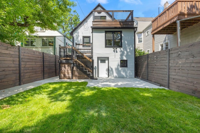 4143 N Drake Ave, Chicago, IL 60618 - rear view of property featuring a fenced backyard, a patio, stairs, and a deck