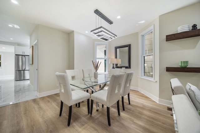 4143 N Drake Ave, Chicago, IL 60618 - dining area with light wood-style flooring and recessed lighting