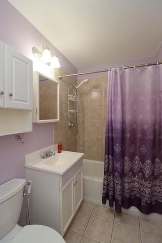 815 Grove Dr Unit 112, Buffalo Grove, IL 60089 - full bathroom with tile patterned floors, vanity, and shower / bath combo with shower curtain