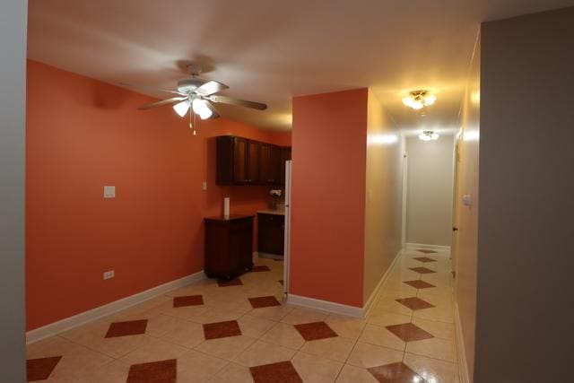 815 Grove Dr Unit 112, Buffalo Grove, IL 60089 - kitchen with a ceiling fan and light tile patterned floors