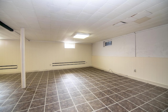 731 Bishop Ct, Bradley, IL 60915 - basement featuring a baseboard heating unit and tile patterned flooring