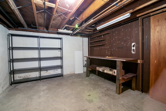 731 Bishop Ct, Bradley, IL 60915 - unfinished basement with a workshop area