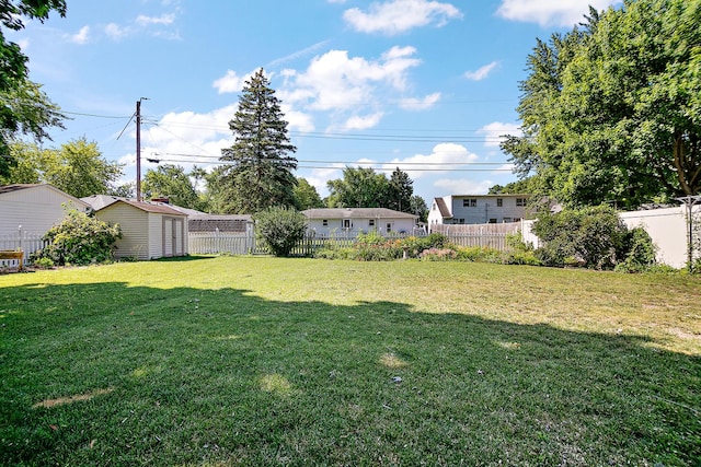 731 Bishop Ct, Bradley, IL 60915 - fenced backyard with a storage shed