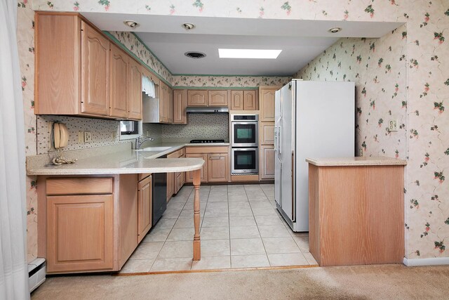 731 Bishop Ct, Bradley, IL 60915 - kitchen with wallpapered walls, white refrigerator with ice dispenser, cooktop, double oven, and light countertops