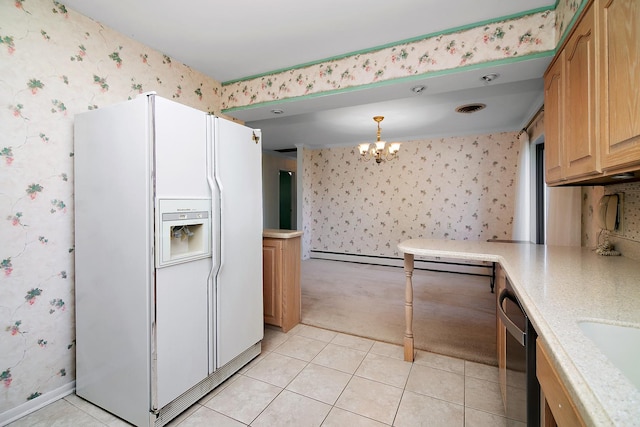 731 Bishop Ct, Bradley, IL 60915 - kitchen with white fridge with ice dispenser, wallpapered walls, light countertops, a chandelier, and light tile patterned floors