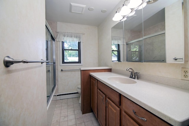 731 Bishop Ct, Bradley, IL 60915 - full bathroom featuring vanity, a baseboard radiator, and tile patterned floors
