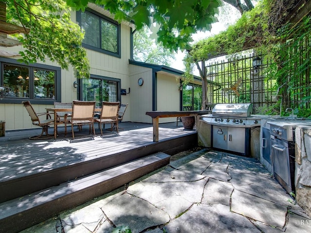 780 Chisholm Trl, Roselle, IL 60172 - view of patio / terrace with exterior kitchen, a wooden deck, and outdoor dining space
