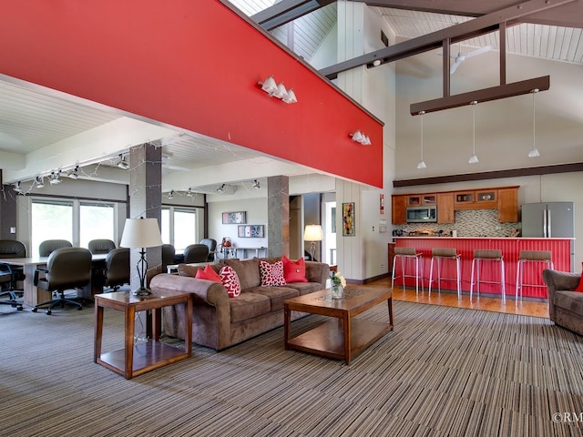 780 Chisholm Trl, Roselle, IL 60172 - carpeted living area featuring rail lighting, a high ceiling, and an office area