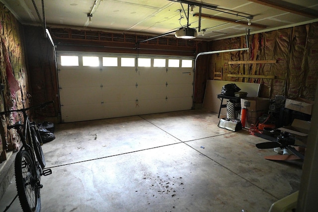 182 Cherrywood Ct, Romeoville, IL 60446 - garage featuring a garage door opener
