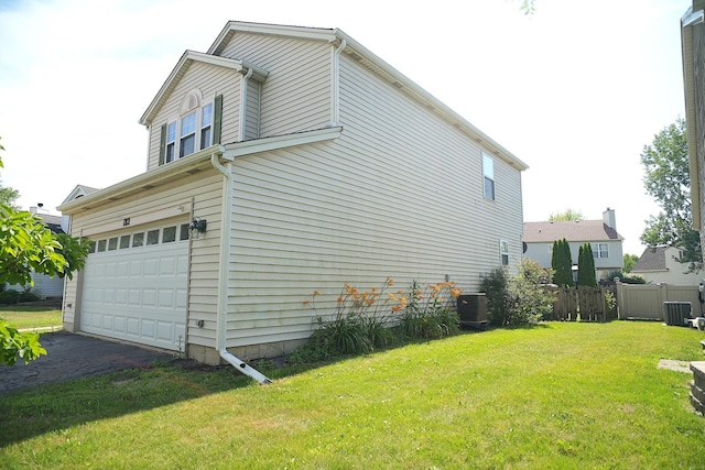 182 Cherrywood Ct, Romeoville, IL 60446 - view of property exterior featuring a garage and asphalt driveway