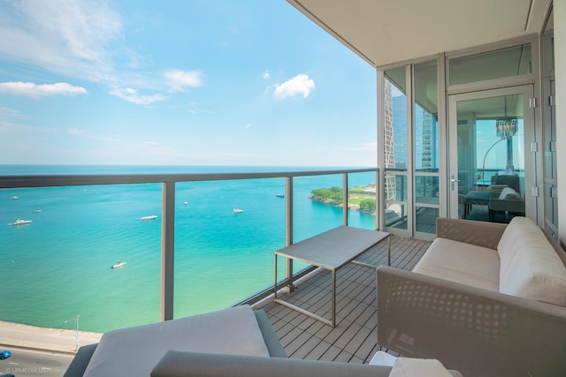 600 N Lake Shore Dr Unit 1905, Chicago, IL 60611 - balcony with a water view and an outdoor living space